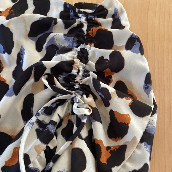 Cheeta print skirt, worn once. Blue, black, brown, and cream. Good condition. - Picture 2 of 10